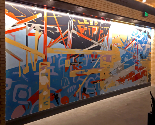 9' x 22' abstract, asymmetrical mural in 3 quadrants with linear design resembling deconstructed bridge trellis in upper left quadrant. Bold fire colors, cool blues, grays and black. In the elevator lobby of The Refinery, a luxury office building in Charlotte.